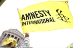 Amnesty International, India, amnesty international halts work in india, Bank accounts