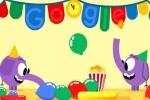 google doodle games, google doodle, google doodle marks new year s eve with a pair of cute elephants, Google doodle