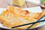 Schezwan Cheese Dosa Recipe, Schezwan Cheese Dosa Recipe, schezwan cheese dosa recipe, Melted butter